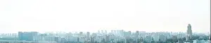 Big Apple Prints: A big city at sunset, a panorama of multi-storey residential buildings