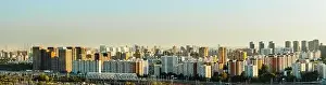 Big Apple Prints: A big city at sunset, a panorama of multi-storey residential buildings