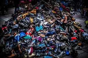 Throw Prints: A big colorful pile of shoes. This was used to show how much waste humans produce