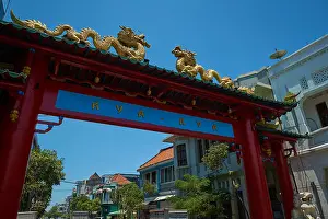 Gateway Prints: The big, red entrance gate with gold dragons to Chinatown in Surabaya, Indonesia