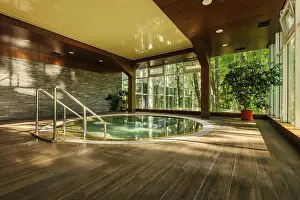 Bubbles Prints: Big round jacuzzi bath in spa center, early morning
