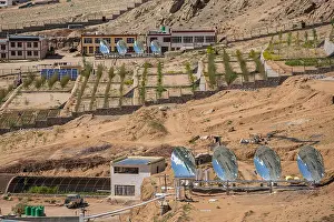 Economical Prints: Big Solar Water Boilers in modern experimental school in Leh