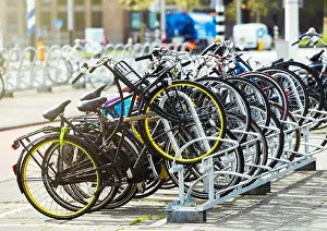 Pedal Prints: Many bikes parked in the street