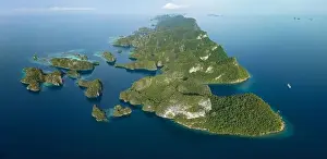 Biodiverse coral reefs surround the dramatic limestone islands that have been uplifted from Raja Ampat's beautiful, tropical seascape