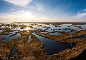 Dnepr Prints: Bird's-eye view of the beautiful Samarskie Plavni in the warm evening light in Ukraine