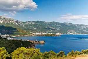 Bird's eye view of historical resort towns of Budva and Becici with luxury hotels