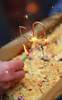 Space For Copy Prints: Birthday Cake with being burnt Sparkler Candles Celebrating 50 Years