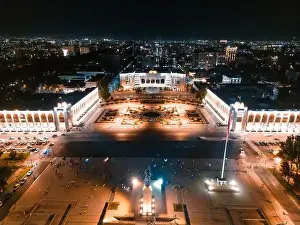 City Landscape Prints: Bishkek, Kyrgyzstan - July 15, 2023: Aerial view of Bishkek city's Ala-Too central square at night