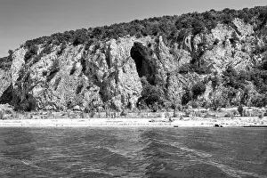 Cliffside Prints: A black-and-white image of a rocky cliff at Megali Prespa Lake