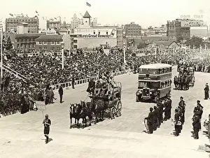 Scout Prints: This black-and-white photograph from the State Records NSW captures a procession featuring both old