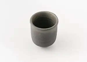 Teacup Prints: An empty black ceramic Japanese teacup