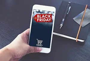 Credit Card Prints: Black Friday sale tag with shopping cart on mobile screen