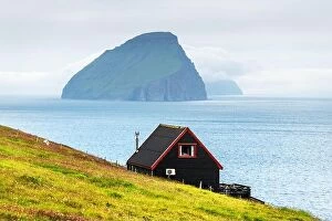 Images Dated 30th July 2019: Black house on famous faroese Witches Finger Trail