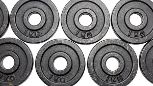 Barbell Prints: Black metal weights 1kg and 2kg on white background with clipping path
