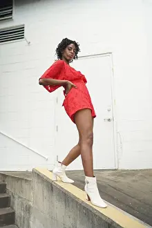 Allure Prints: Black Model leaning on ramp, power pose as she leans into herself
