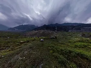Lake Mountains Prints: Black mountains in rain clouds
