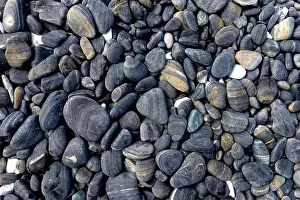 Pebble Prints: Black pebble stones island in Koh hin ngam, Tarutao National Park, Satun, Thailand