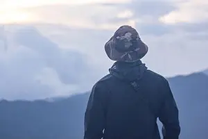 Wonderful Prints: The black shirt men are watching the fog on the mountain