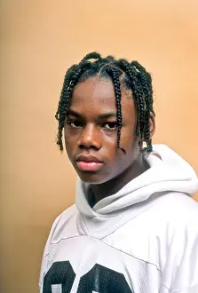 Racial Prints: Black teen boy portrait smile dreadlock hair style
