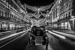 Motion Blur Prints: Black and white golden angel christmas decorations on Regent Street