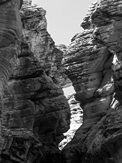 Black and White view of Weathered Rugged Sandstone cliffs, forming a Slot Canyon, at Willis Creek, Utah, USA