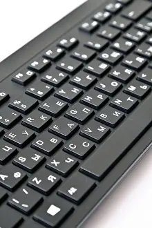 Detection Prints: black wireless keyboard with Russian and English letters