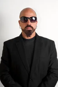 Headset Prints: blacks man with glasses, beard and black jacket