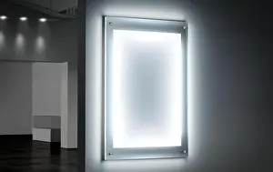 Holder Prints: Blank white illuminated poster mockup in dark hall