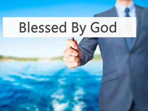 Miracle Prints: Blessed By God - Businessman hand holding sign