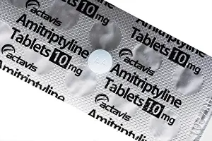Tablets Prints: A blister pack of actavis Amitriptyline 10mg tablets on a white background