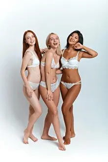 Waist Prints: blonde beautiful girl standing with her best friends and having fun