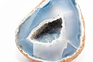 Quartz Prints: Blue colored geode outside looking like usual rock inside full of small tiny crystals