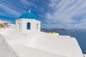 Images Dated 10th May 2019: Blue dome in Santorini, Fira. Summer vacation landscape, peaceful sea view and volcanic cliff