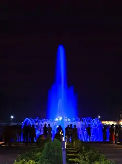 Refresh Prints: Blue fountain at night on a park center