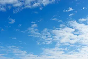 Cloud Cover Prints: Blue sky with light cloud cover