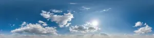 blue skybox with cumulus cloud as seamless hdri 360 panorama with zenith in spherical equirectangular projection may
