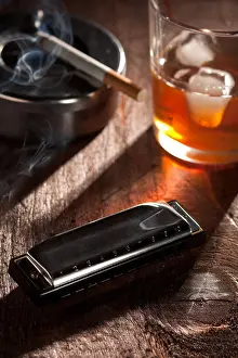 Cigarette Prints: Blues Black Harmonica with a Glass of Whiskey and Smoking Cigarette with Ashtray