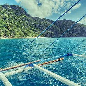 Nido Prints: blur in philippines view of the island hill from the prow of a boat