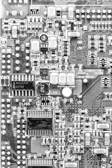 Silicon Prints: blurred circuit board in the light like concept of technology and future micro technology and computer