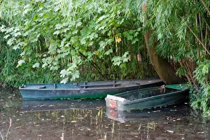 Impressionist Prints: Two boats in Monet's garden pond