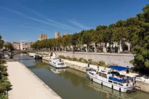 Mediterranean Town Prints: Boats moored along Canal de la Robine, Narbonne, Occitanie, France