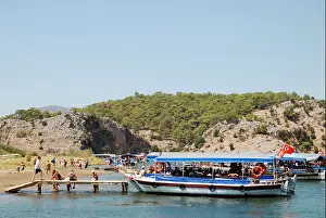 Motorboat Prints: Boats with tourists moored on Dalyan riverside