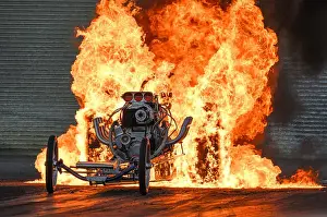 Burnout Prints: Bob Hawkins performs a fire/flame burnout in his slingshot dragster at Santa pod Raceway