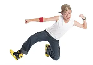 Flexibility Prints: Full body cool looking Asian teen hip hop dancer dancing isolated on white background