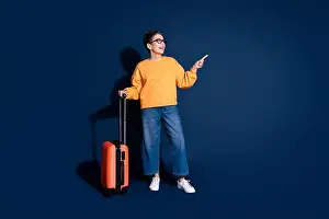 Registration Prints: Full body photo of mature woman traveling suitcase point look empty space dressed stylish yellow clothes isolated
