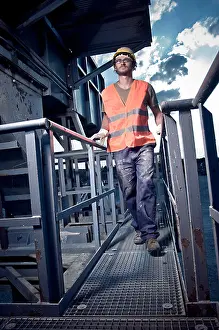 Construction Industry Prints: full body portrait of worker with high visibility clothing