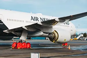 Fuselage Prints: A Boeing 777 in storage with wheel and engine covers in Christchurch Airport during the coronavirus pandemic
