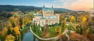 Historic Landmark Prints: Bojnice castle. Panoramic aerial view of a neo-gothic romantic fairy-tale castle in a colourful autumn garden