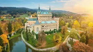 Historic Landmark Prints: Bojnice castle. Panoramic aerial view of a neo-gothic romantic fairy-tale castle in a colourful autumn garden