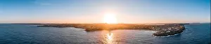 Bondi Beach Drone Shot at Sunset with Sydney CBD in background at Sunset